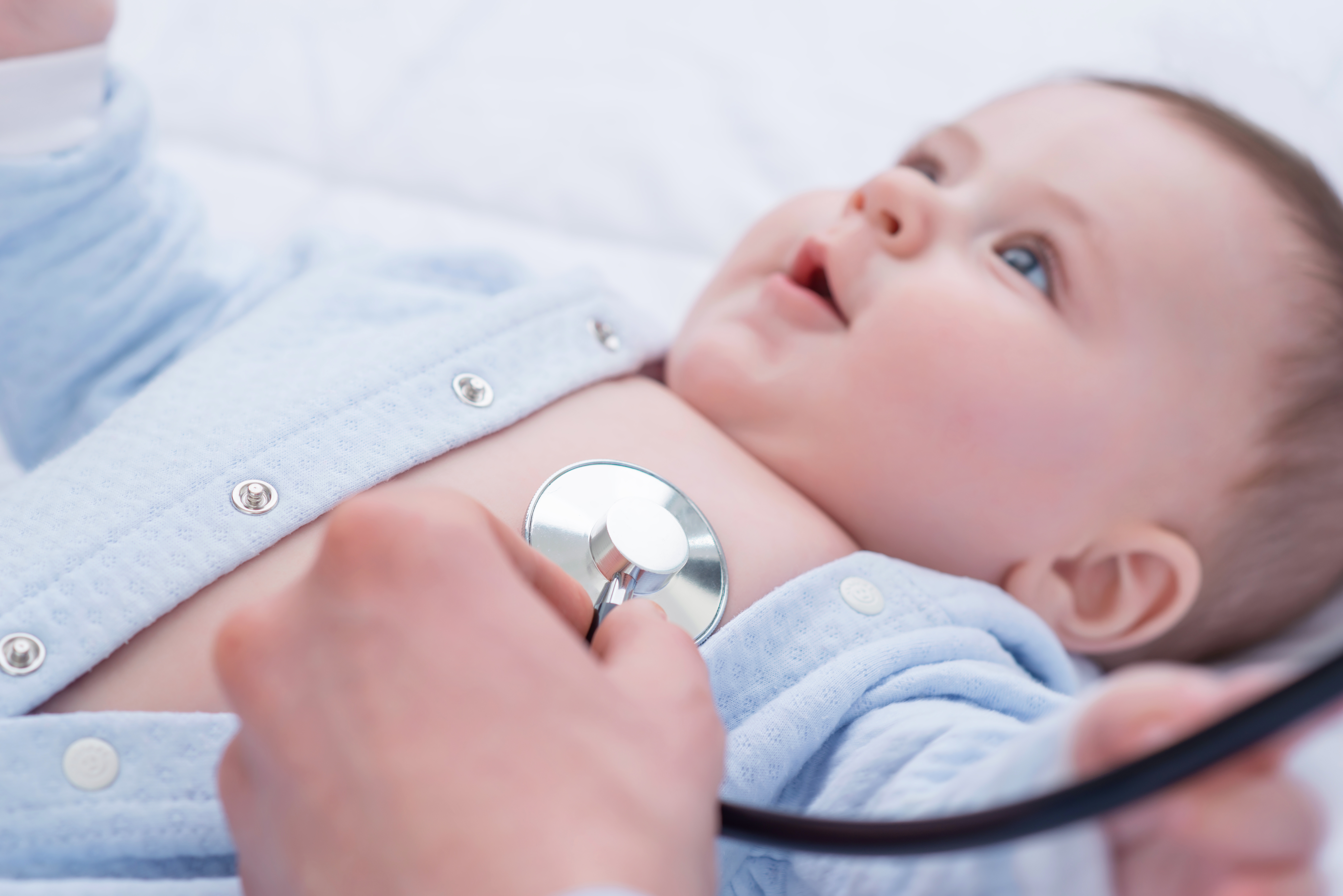 Pediatrician Examining Infant